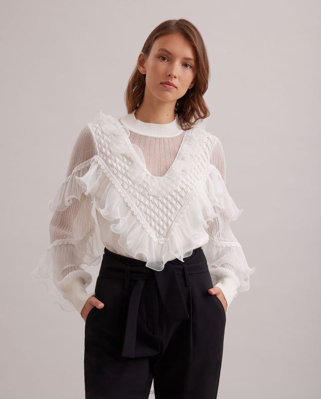 Anne Fontaine vrouwen oeuvre top, gebreid met lange mouwen, transparante details en uitlopende ruches kleding wit 06TRT288